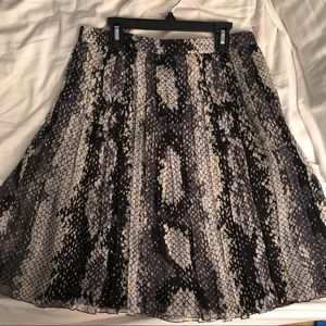 Silk chiffon, snakeskin print Prada skirt.
